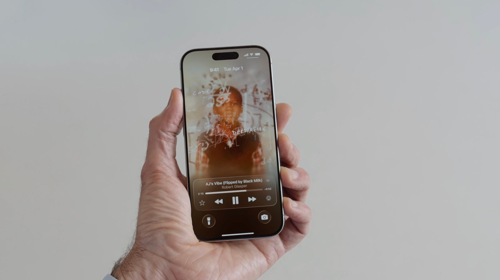 iOS 26 Forvandler iPhone-låseskærm med Animerede Albumcovers